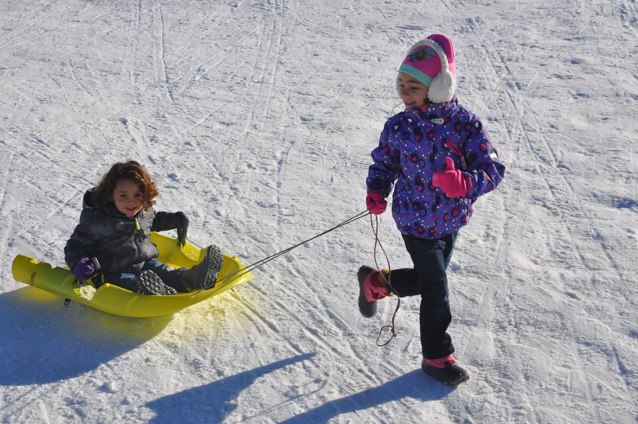 person(0.93), person(0.89), surfboard(0.59), snowboard(0.56)