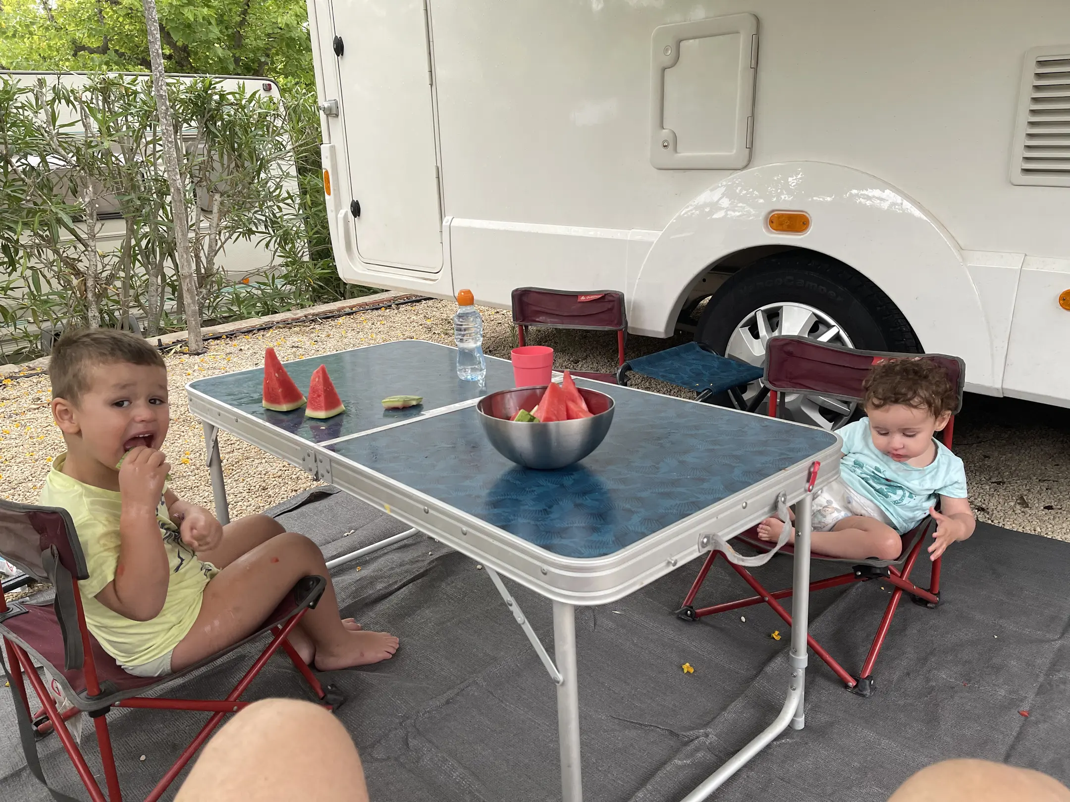 bowl(0.91), chair(0.76), person(0.75), bottle(0.65), dining table(0.65), truck(0.60), chair(0.58)